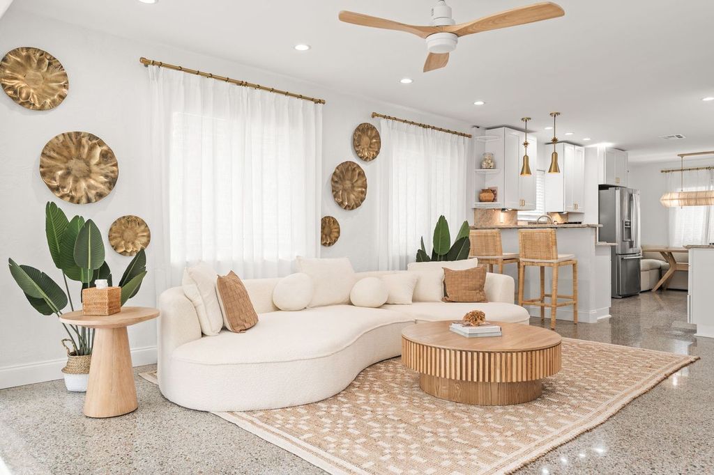 Coastal vacation rental living room renovation at Sea Breeze designed to enhance guest experience